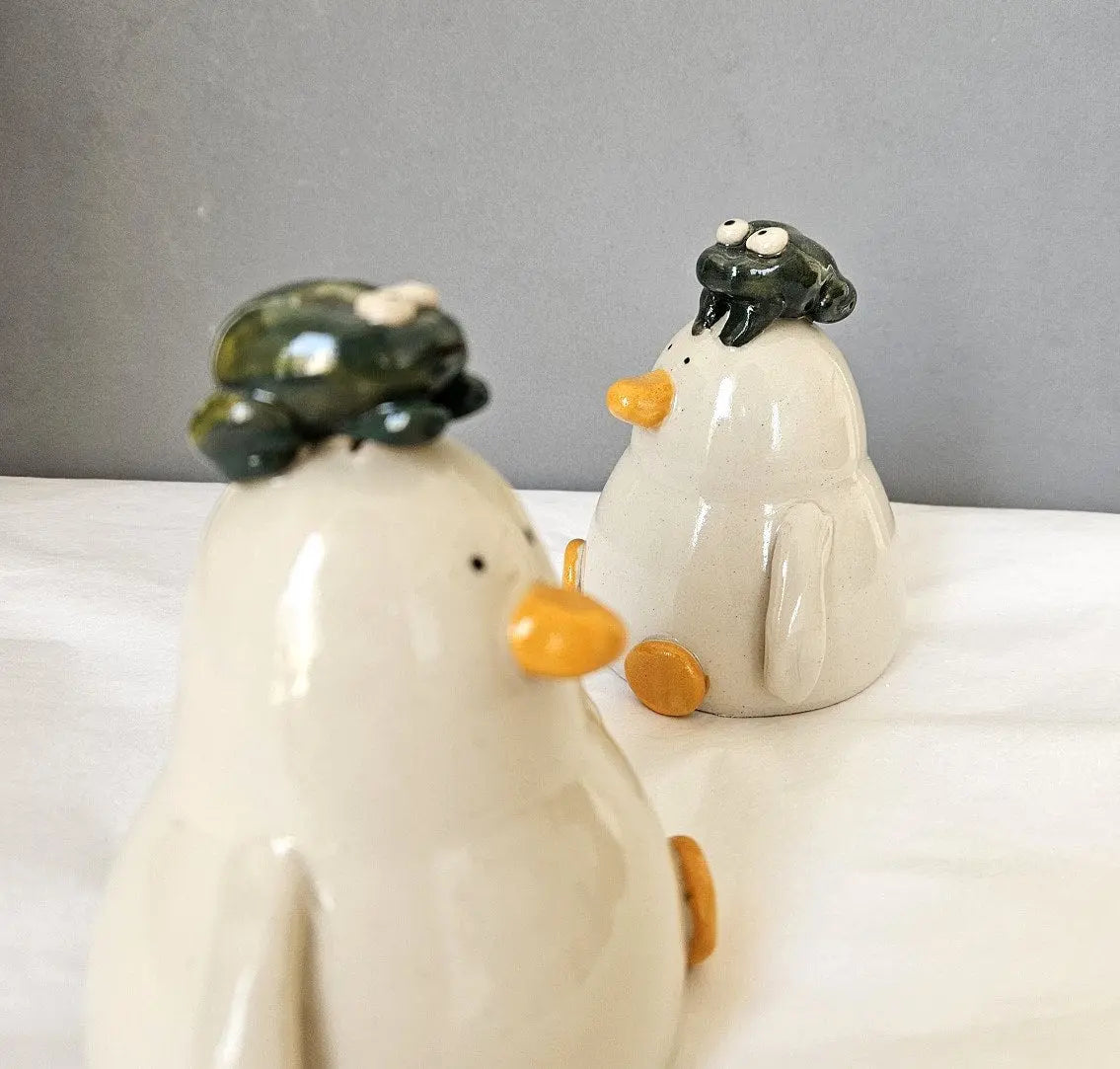 Rhydian with the Amphibian - Frog Duck - Richard Moonstreet Ceramics Handmade ornament with frog sat on head