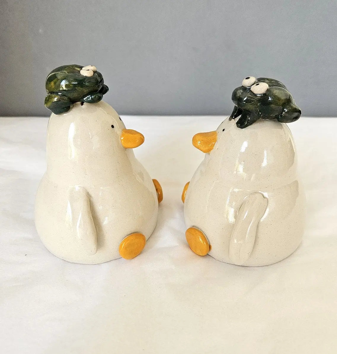 Rhydian with the Amphibian - Frog Duck - Richard Moonstreet Ceramics Handmade ornament with frog sat on head