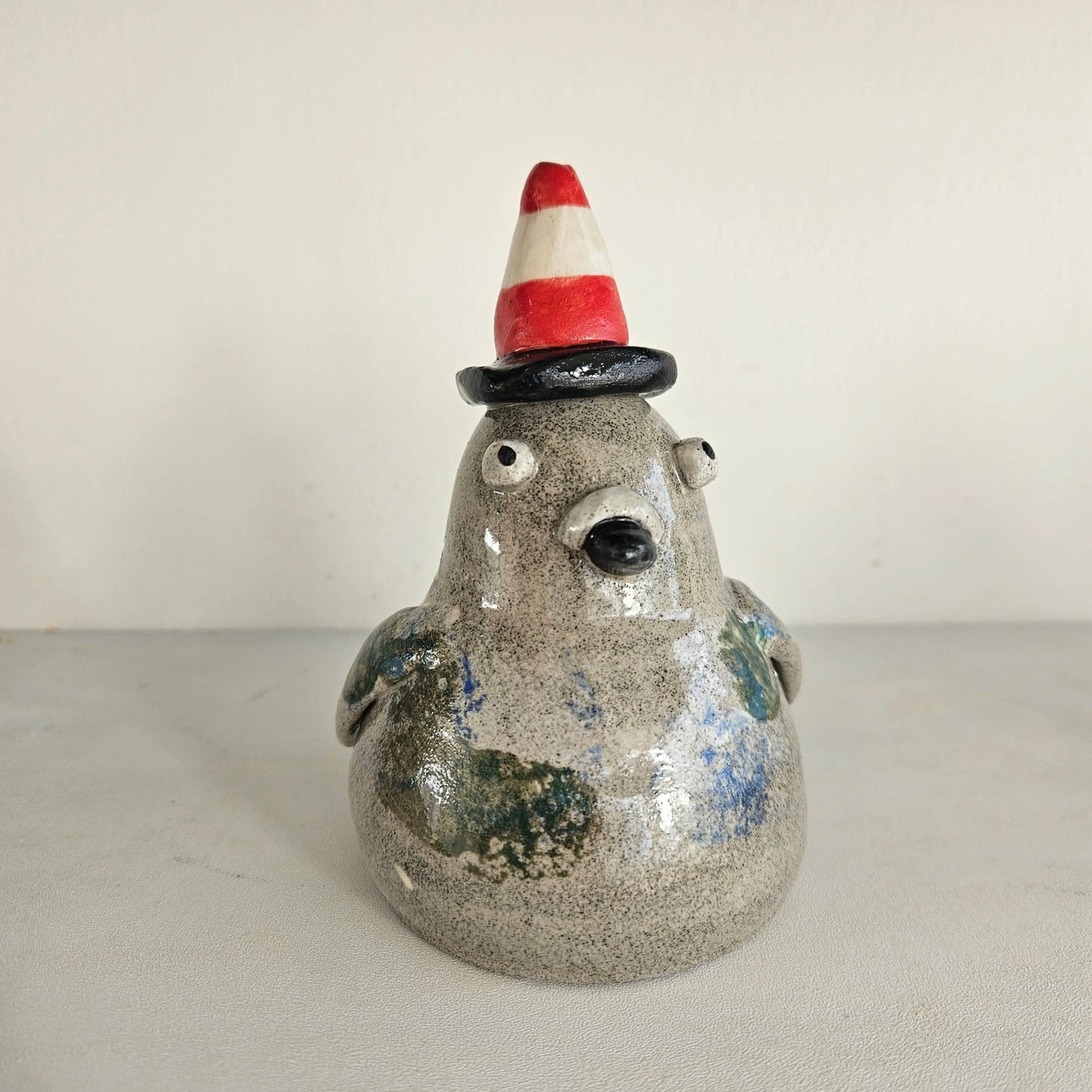 Sloane with the Cone (Pigeon with Traffic Cone) - Richard Moonstreet Ceramics Glasgow inspired pigeon traffic cone statue. Original artist Rebel Bear.